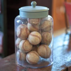 Jar with antique baseballs, $82. Available at Warehouse Provence.